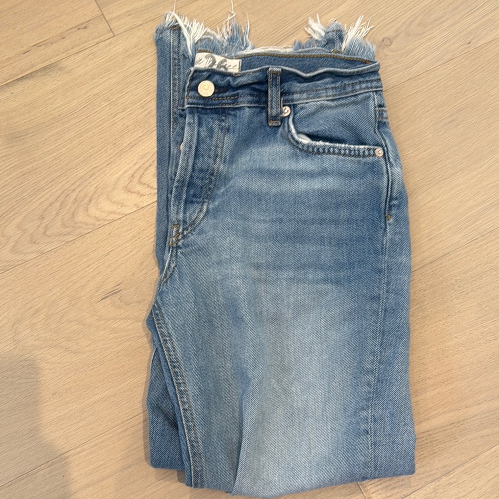 Free people jeans with rips at knees